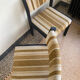 2 wooden chairs and vintage fabric