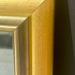 Wooden mirror, smooth and gilded