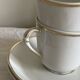 10 tasses à expresso et soucoupes en porcelaine Bernardeau Limoges Ronsard