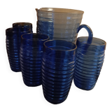 Orangeade carafe service and 6 glasses in a wicker basket