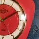 Vintage formica silent wall clock "English red Lutetia"