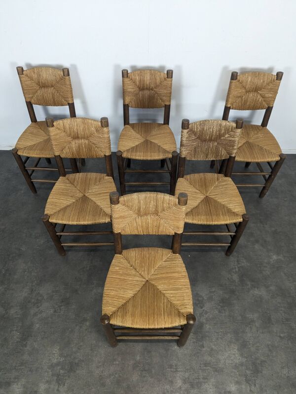 Série de 10 chaises modèle Bauche par Charlotte Perriand, circa 1960