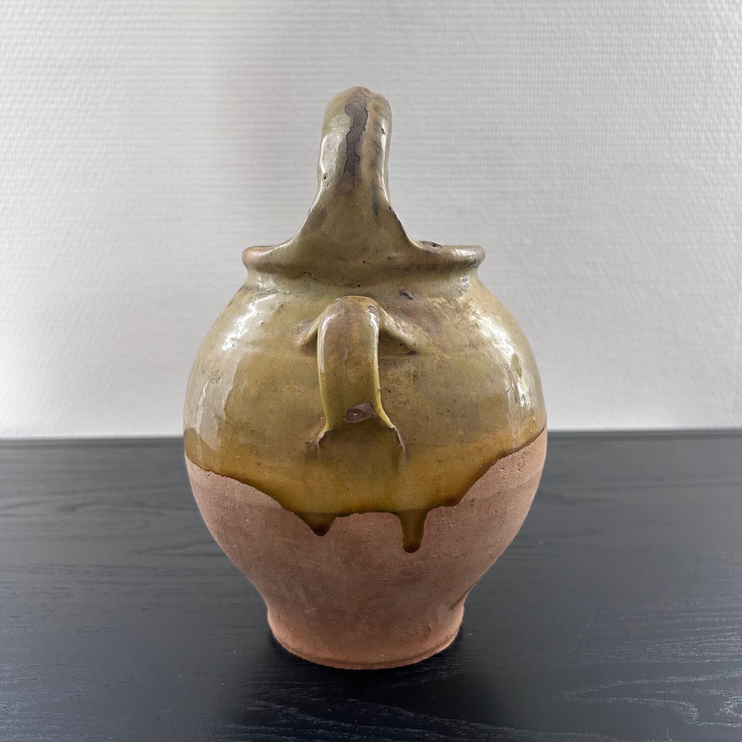 Antique two-material water jug