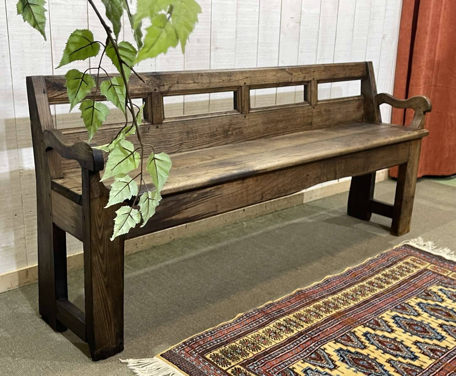 Rustic chestnut bench from the late 19th century.