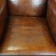 Cognac-colored sheep leather Art Deco design armchair finished with piping