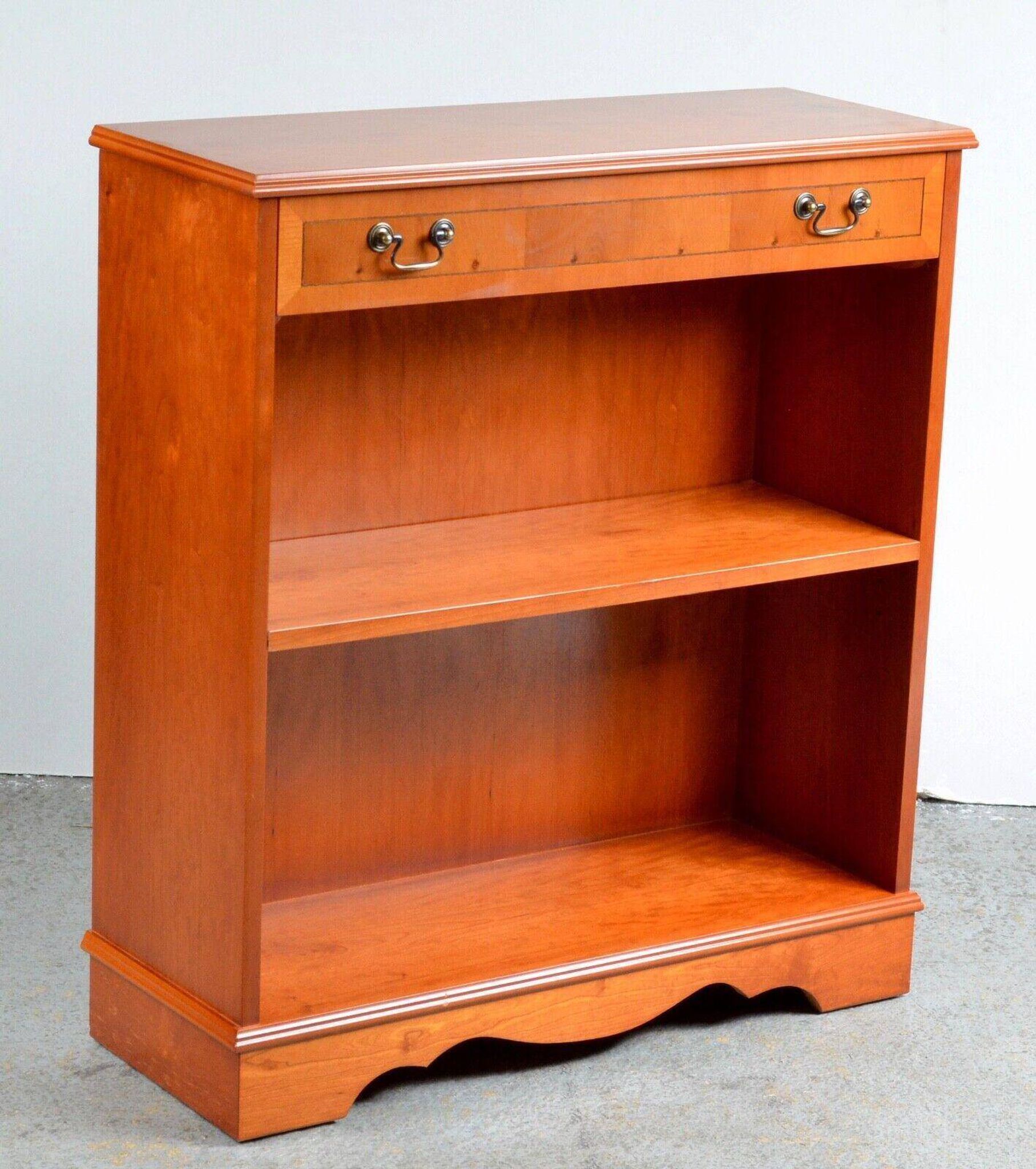 Pair of light walnut bookshelves with inlays and adjustable shelves.