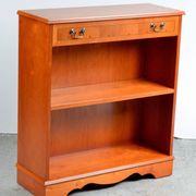 Pair of light walnut bookshelves with inlays and adjustable shelves.