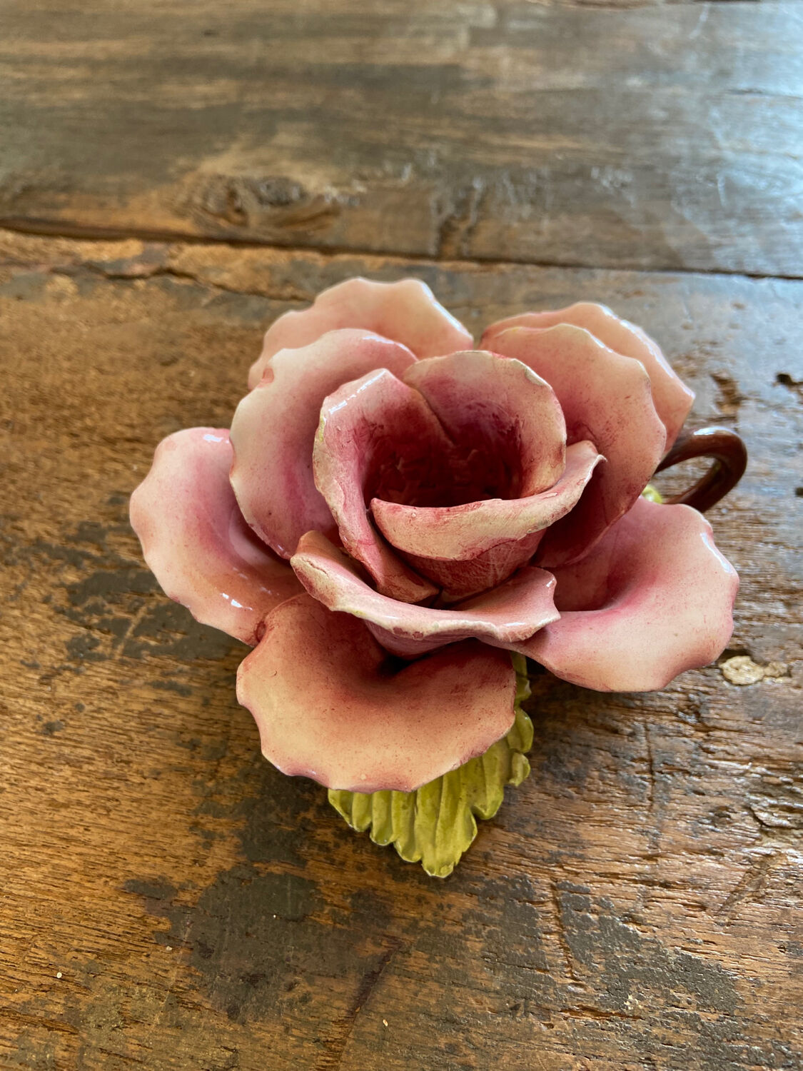 Rose-shaped earthenware candle holder