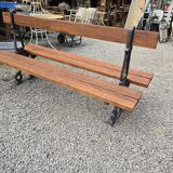 Antique double garden bench from the city of Paris in cast iron and wood