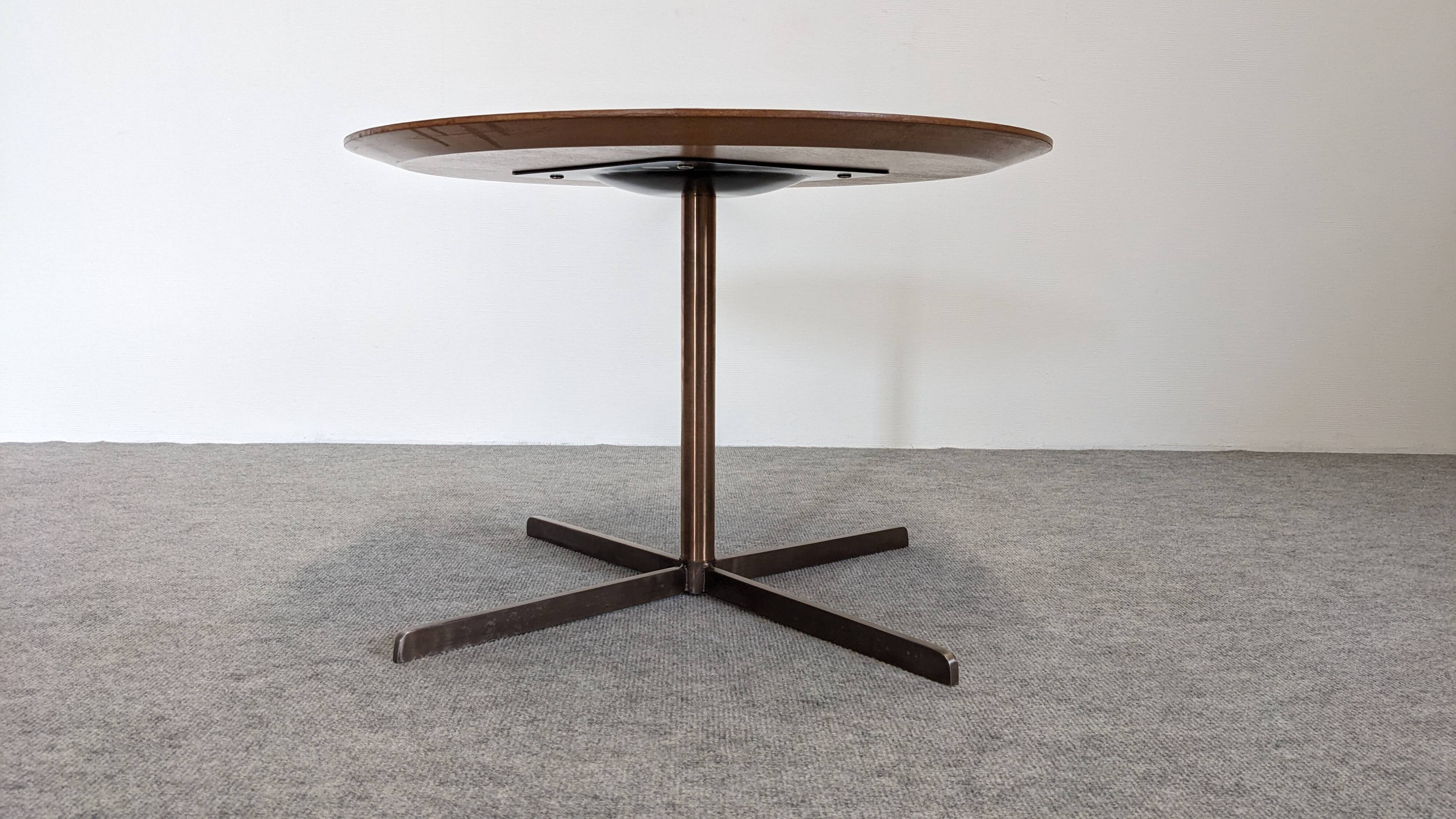 Contemporary round side table or end table.