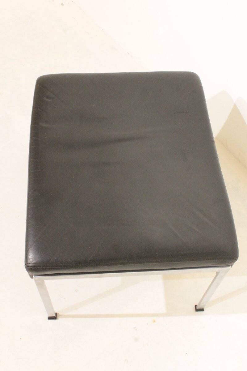 Pair of designer leather and brushed stainless steel footrests - Rob Parry