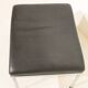 Pair of designer leather and brushed stainless steel footrests - Rob Parry