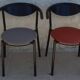 4 gondola-style chairs with a sturdy metal frame and faux leather.