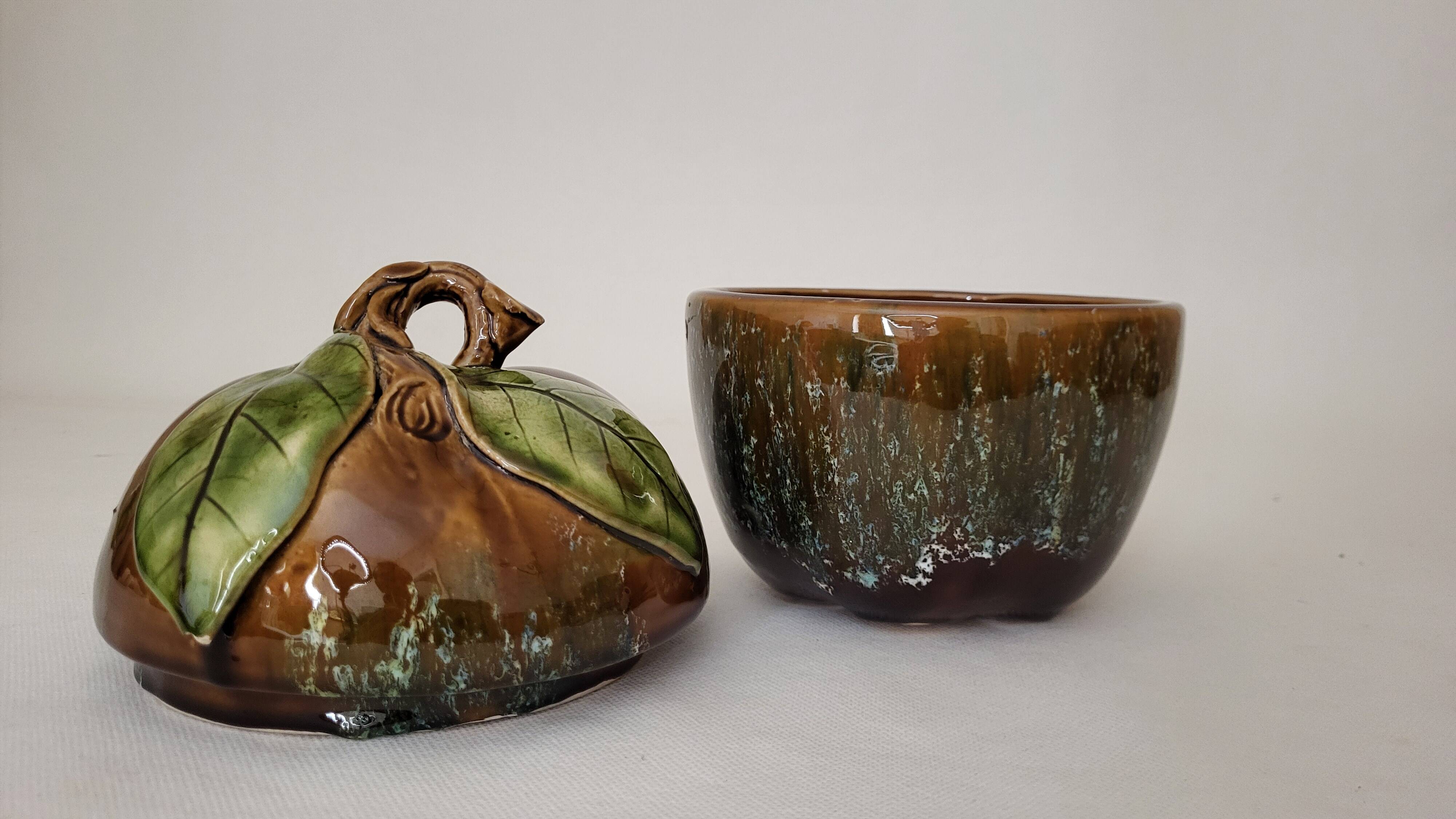 Covered stoneware pot