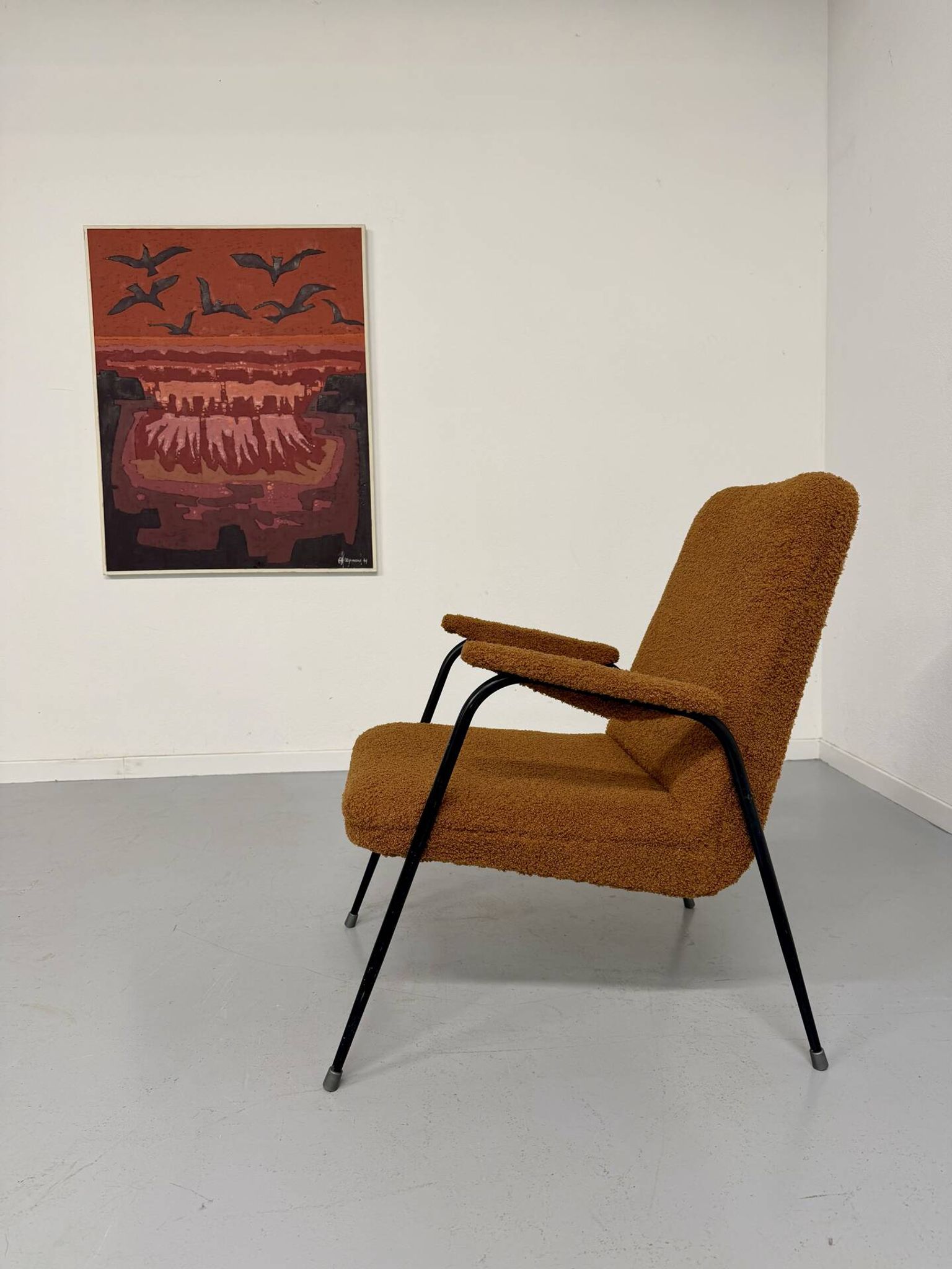 Vintage metal armchair with orange boucle fabric, French design from the 1950s.