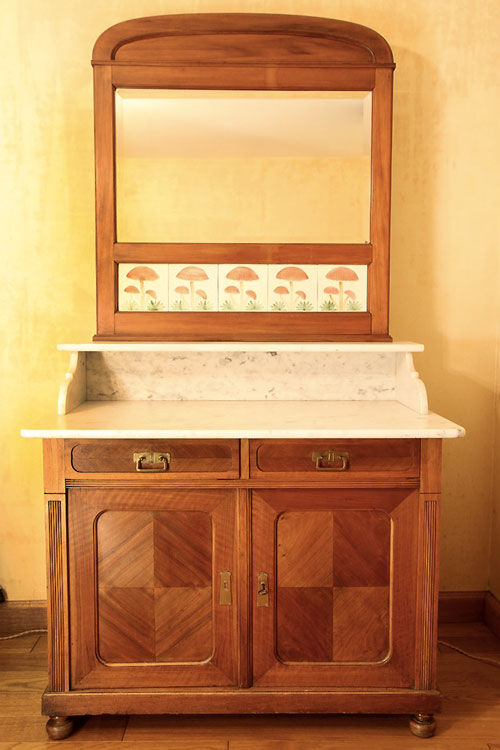 Vintage vanity toilet furniture with marble top.