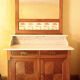 Vintage vanity toilet furniture with marble top.