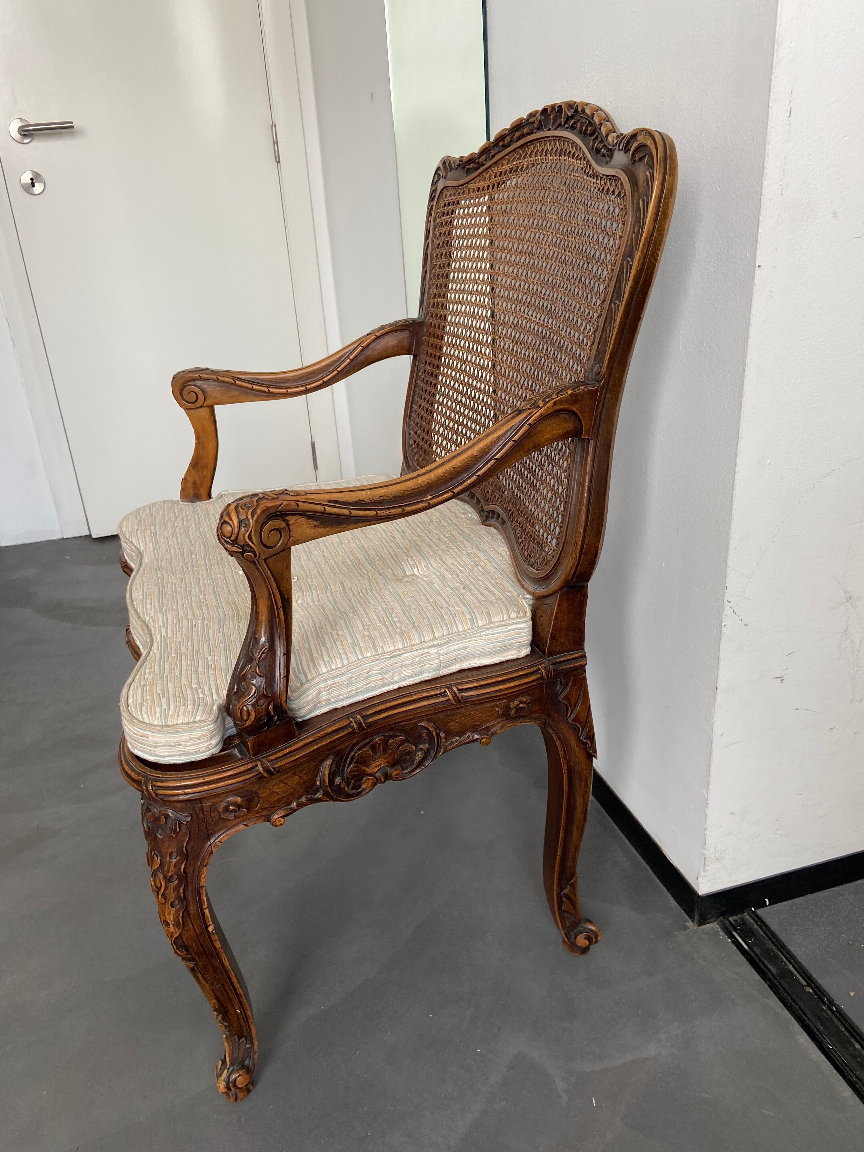 Regency canned armchair in carved walnut