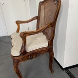 Regency canned armchair in carved walnut