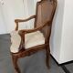 Regency canned armchair in carved walnut