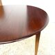 Danish round dining table in rosewood – 1950s design with butterfly extension.