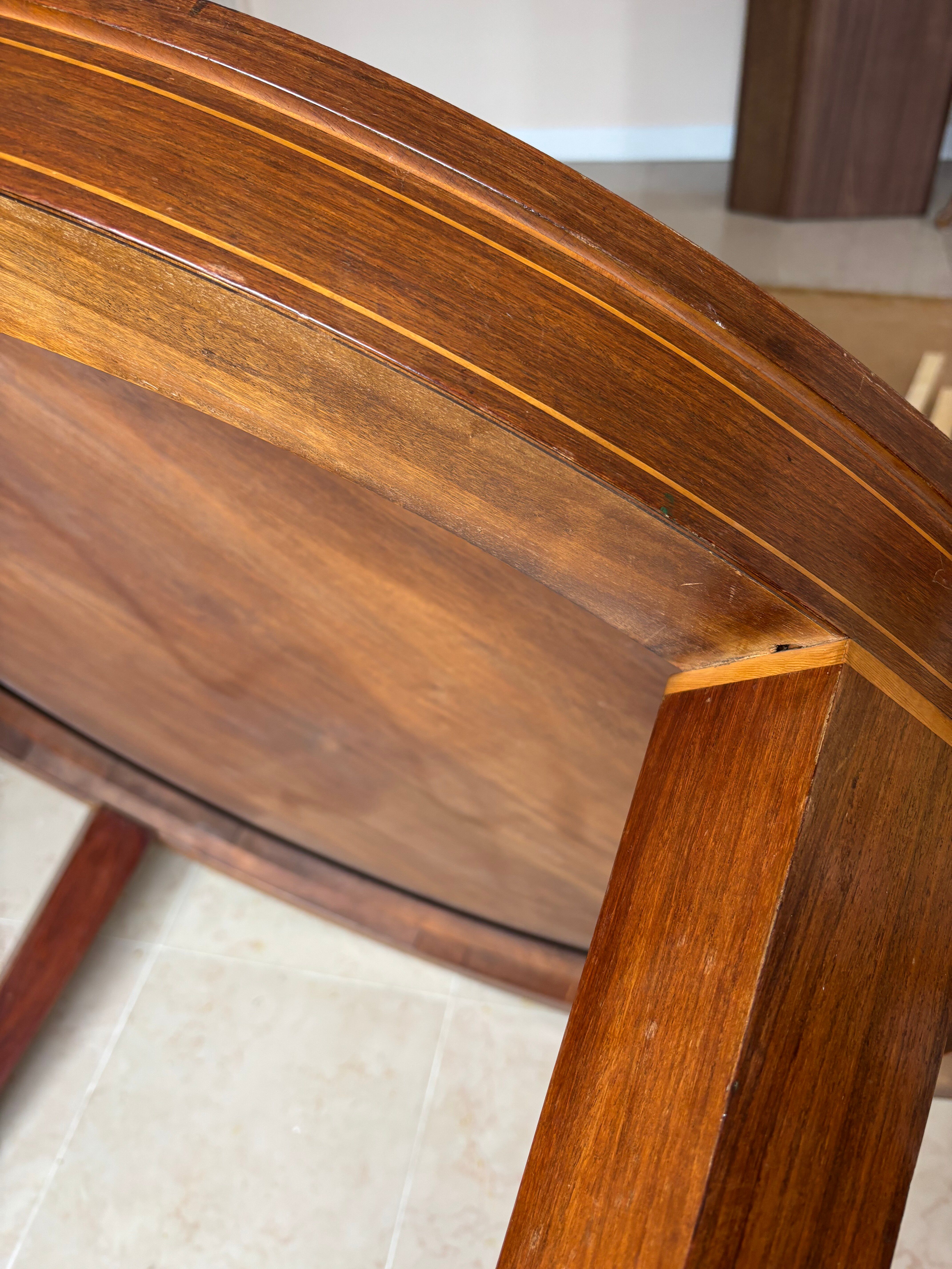 Impeccable 1950s round table in mahogany.