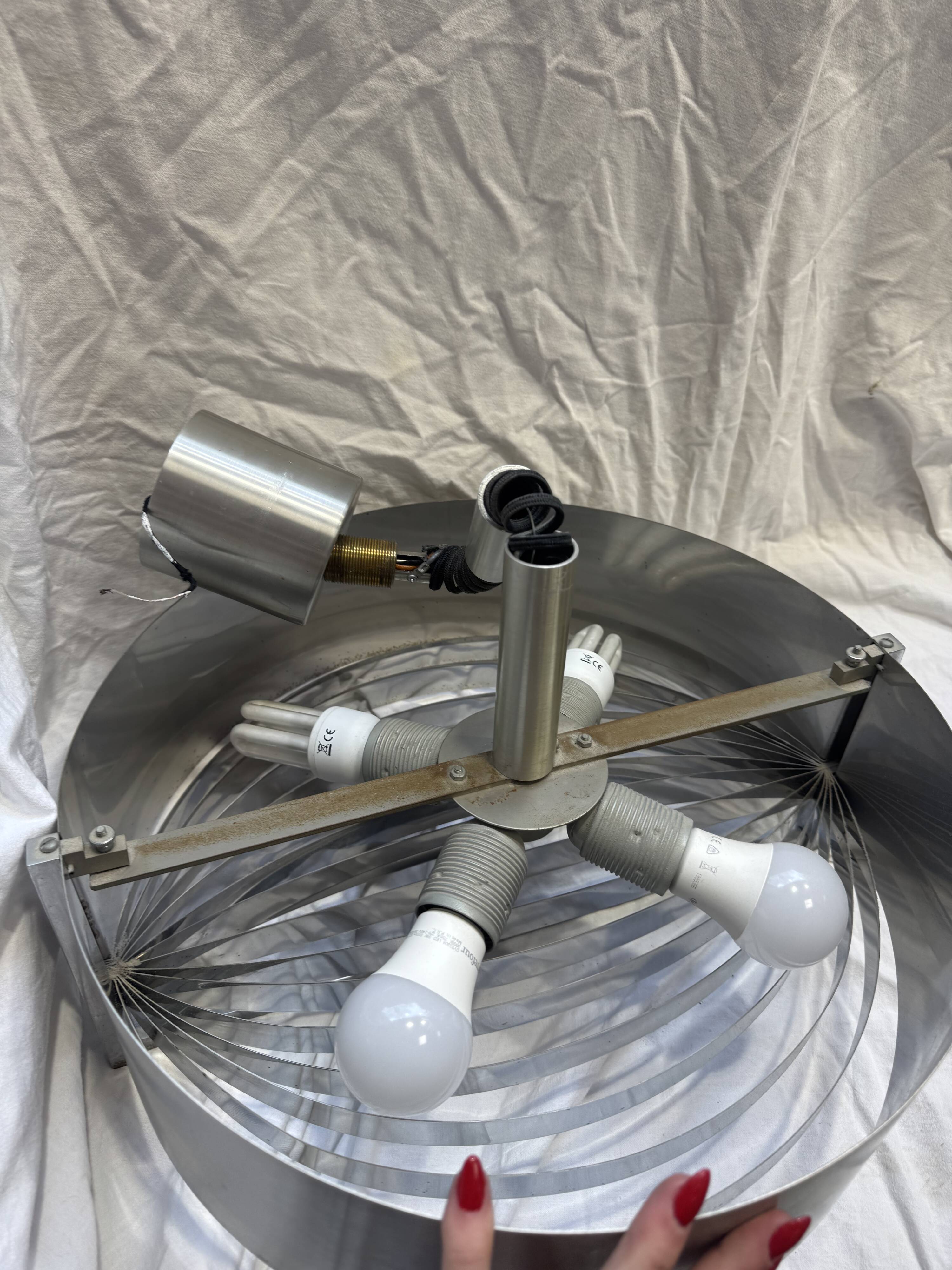 Brushed steel suspension