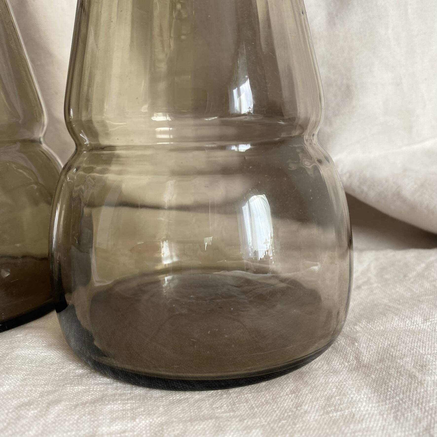 Pair of antique smoked glass vases carafes
