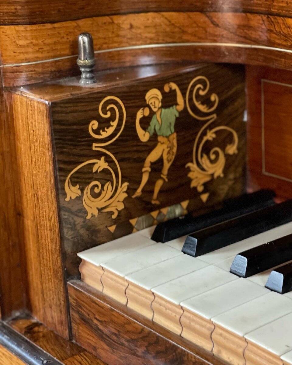 Piano table in rosewood with mother-of-pearl and fruitwood marquetry circa 1830.