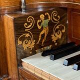 Piano table in rosewood with mother-of-pearl and fruitwood marquetry circa 1830.