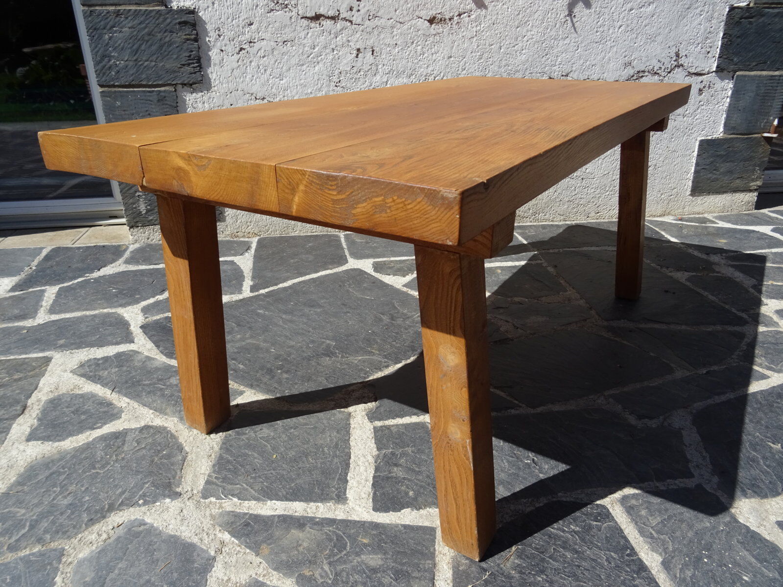 Massive elm coffee table of brutalist spirit