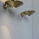 Pair of solid brass wall sconces, France, 1970.