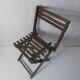 Old folding wooden chair for children