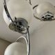 Lampe art déco en argent avec trois abat-jours en forme de sphère