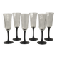 Set of 6 Octime champagne flutes in glass with black stem.