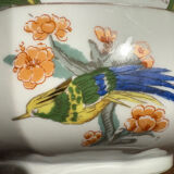 Shallow porcelain plate from Limoges Raynaud, bird decoration.