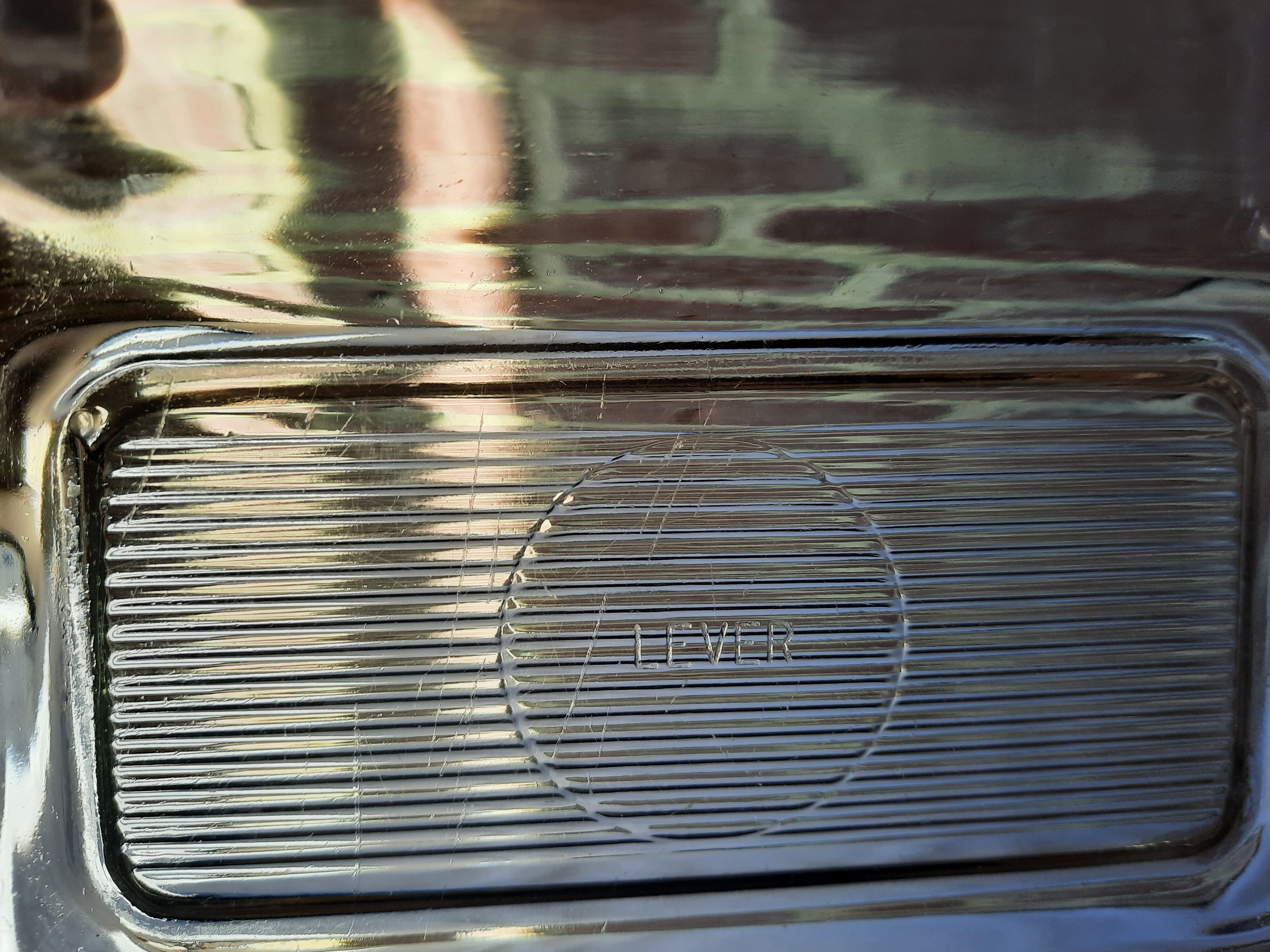 Transparent glass butter dish from lever