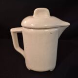 Vintage vase, geometric frieze and flowers with a black border.