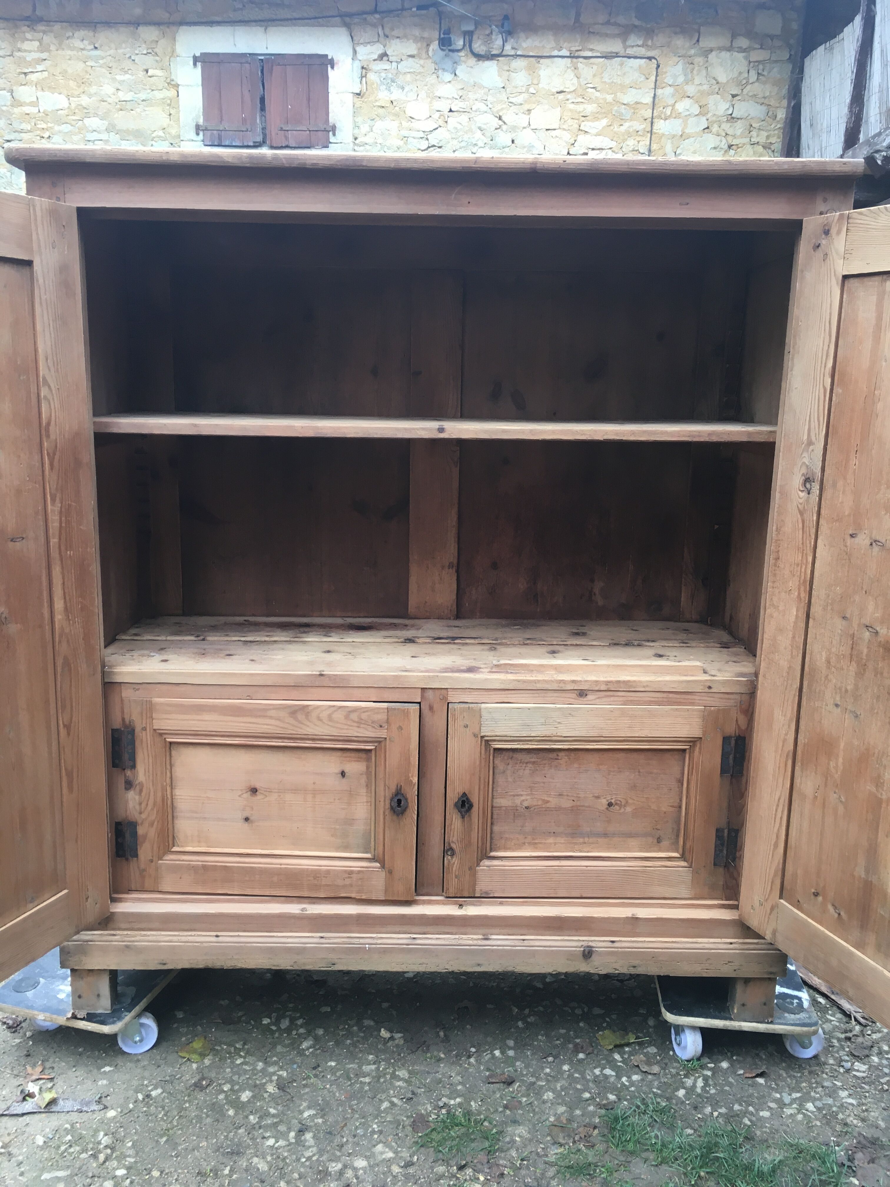 Wooden cabinet with interior doors