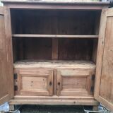 Wooden cabinet with interior doors