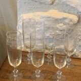 6 chiseled champagne flutes on vintage floral frieze pattern