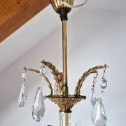 Antique chandelier with pendants, in bronze and glass pendants.