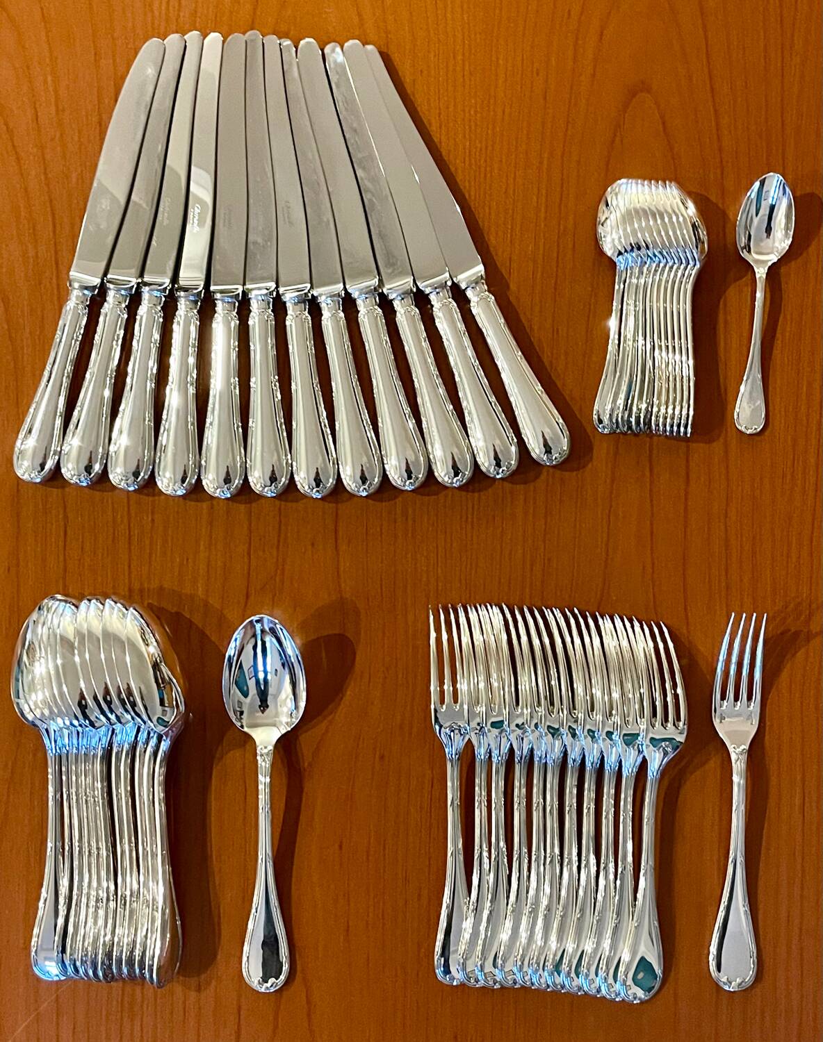 Christofle 48-piece flatware ribbon set, near mint condition