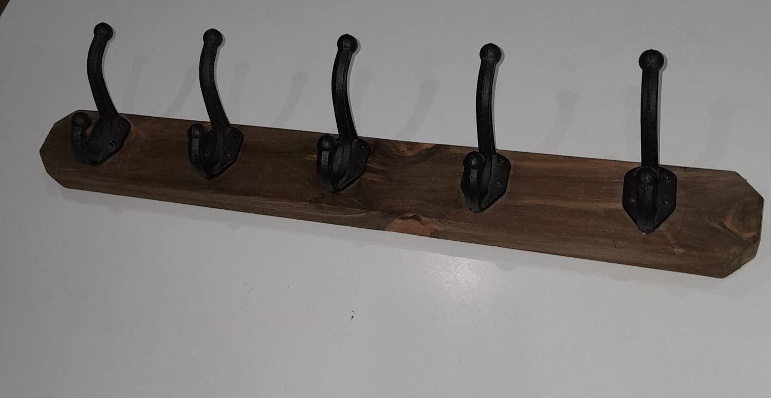 Vintage wooden coat rack with 5 double cast iron hooks
