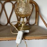 Table lamp with amber glass globe and brass base