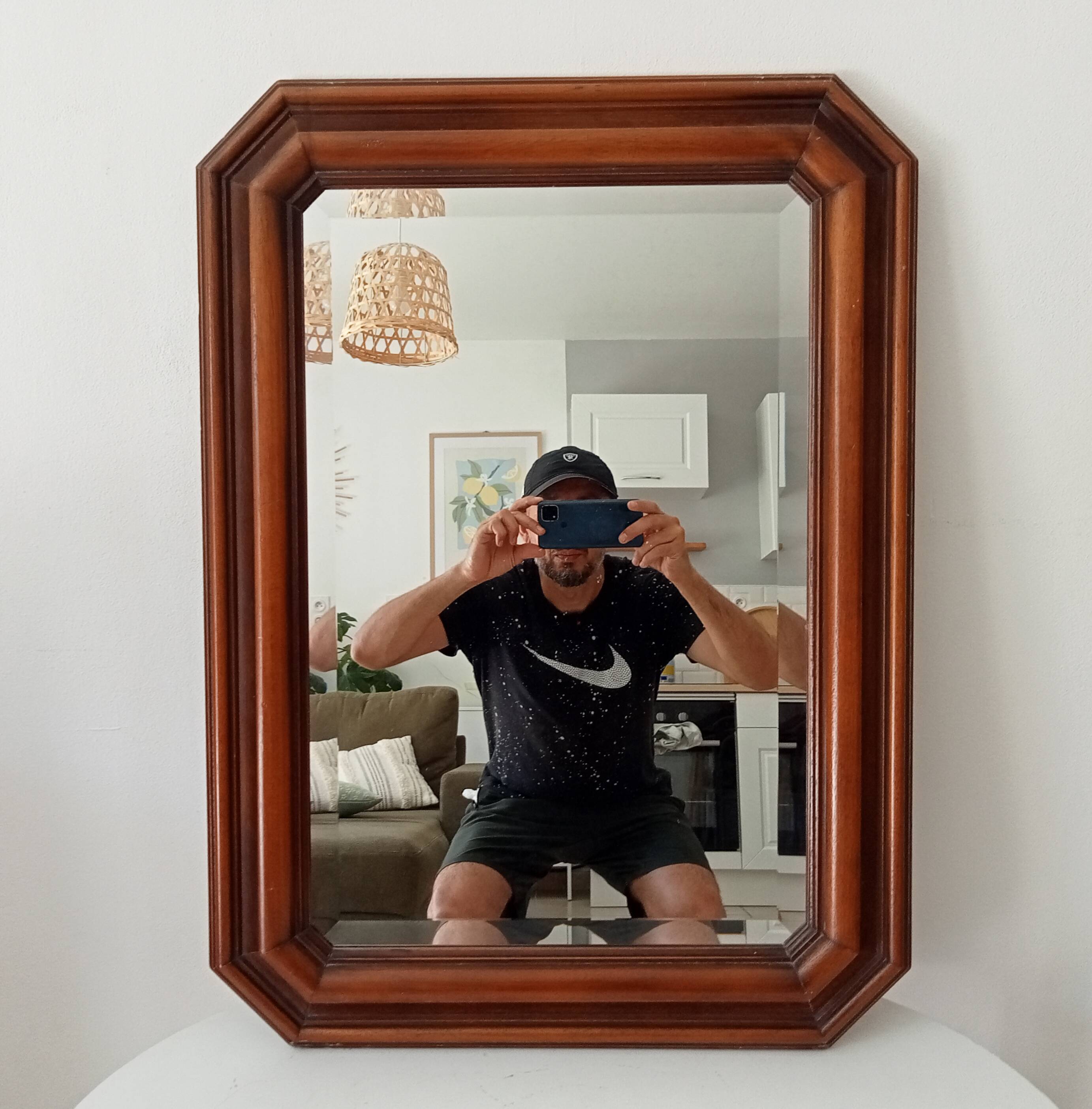 Vintage octagonal bevelled mirror from the 1960s.