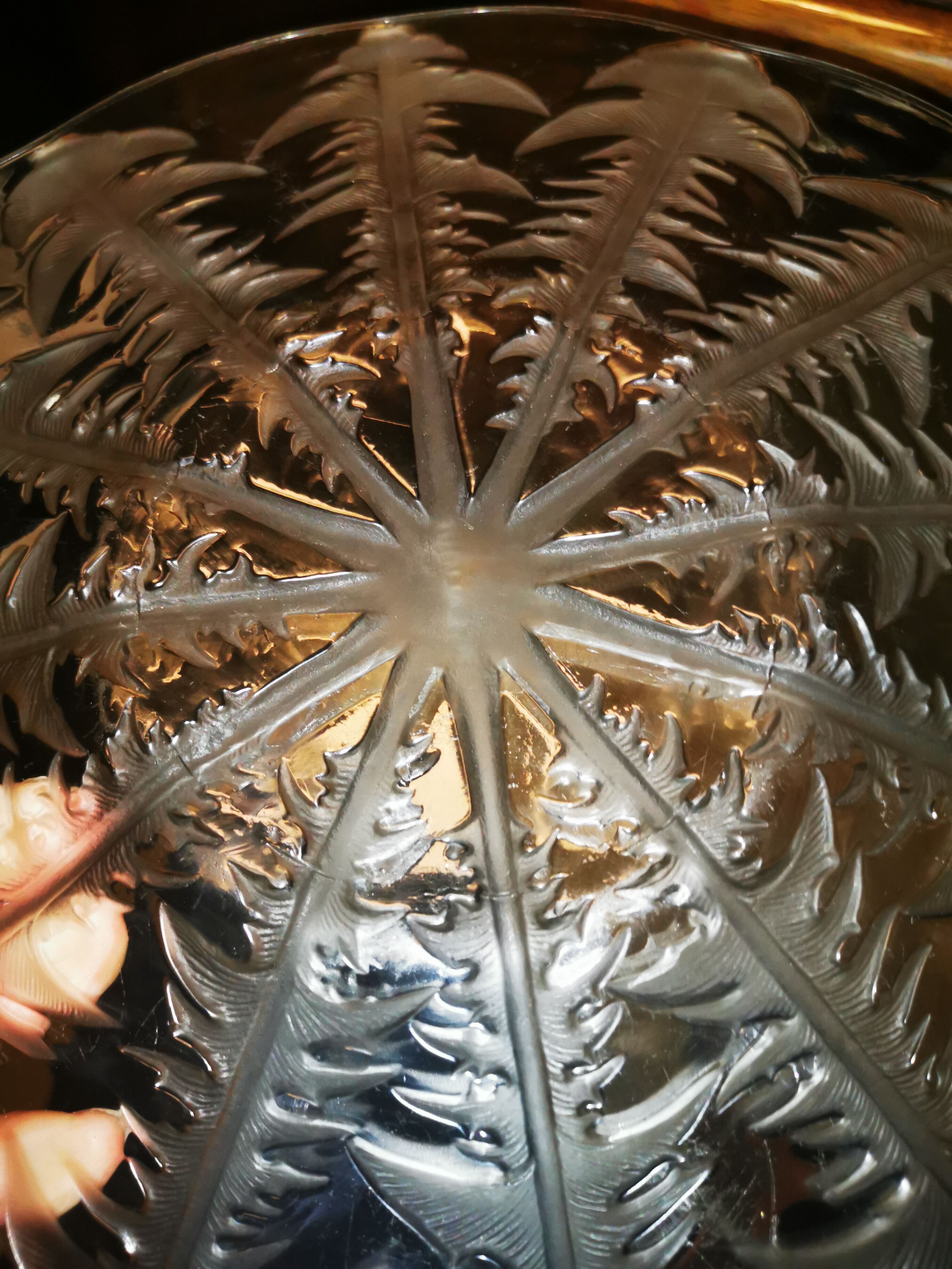 Dish by René Lalique, model "Dandelions", in patinated glass