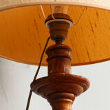 Carved wooden lamp, fiber shade