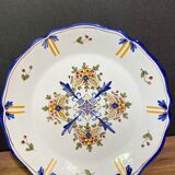 Pair of Nevers earthenware plates signed Georges