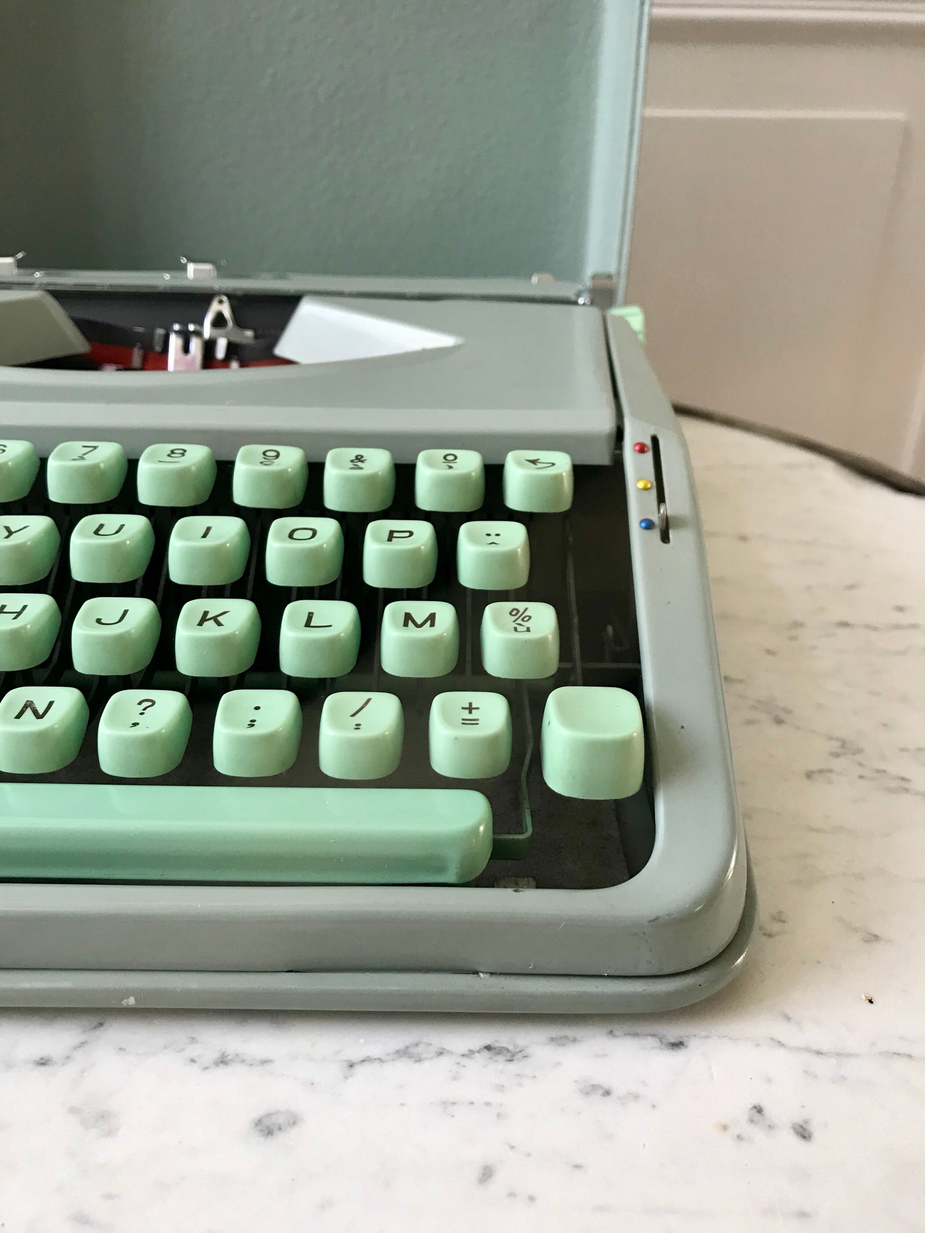 Mint green typewriter hermes baby made in switzerland